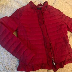 Red Escada quilted jacket for women.